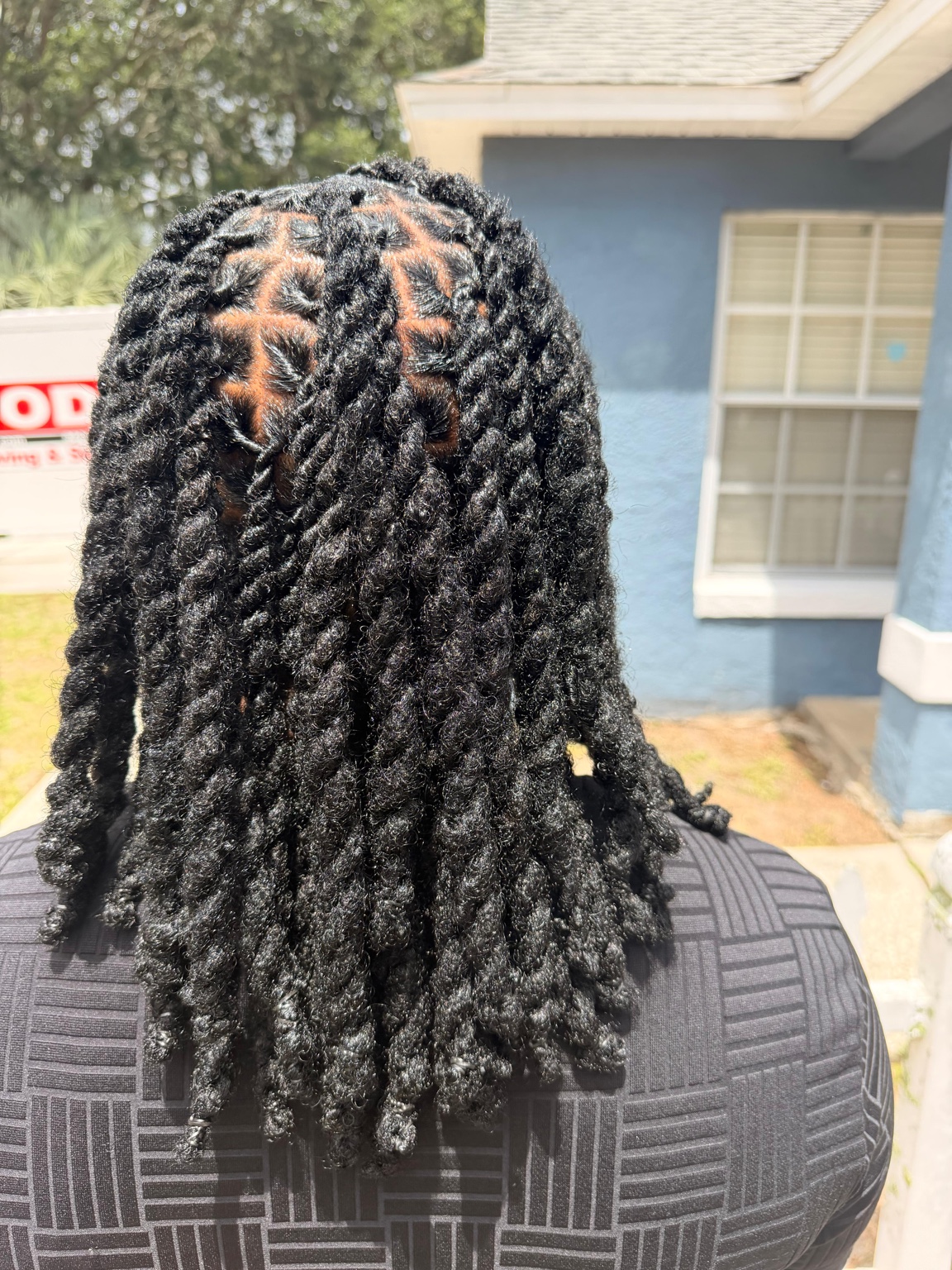Fresh loc retwist and two-strand style