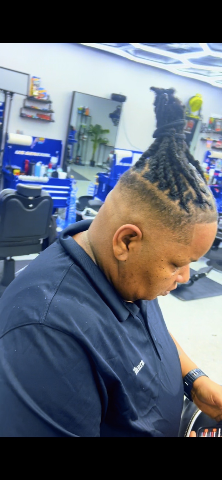 Loc updo with clean fade