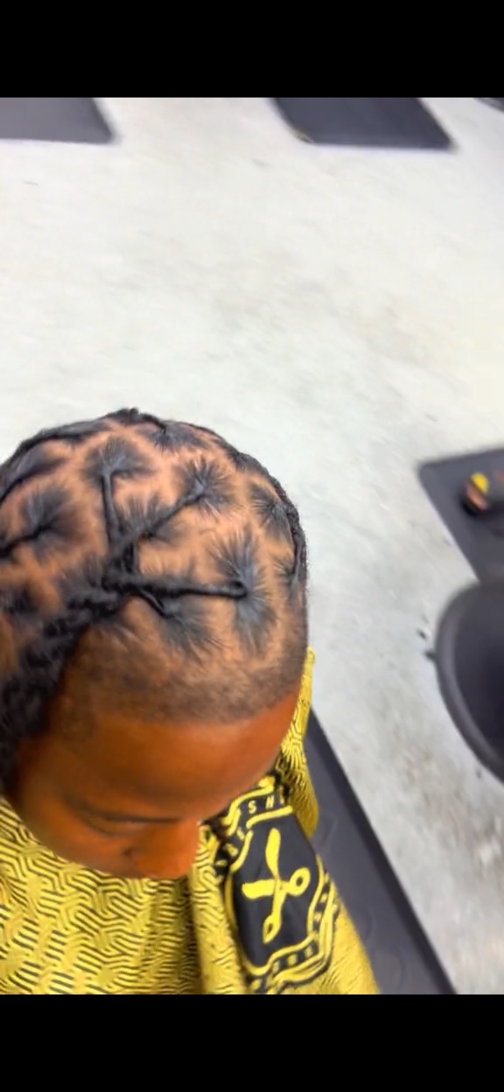 Clean loc parting and styling